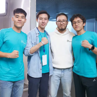 Beelieve team is taking a picture with Samsung mentor (Left to right Adilet Dauleti, Zhangerey Bekbulat, Berik Umarov - Samsung, Amirkhan Aidarkhan)